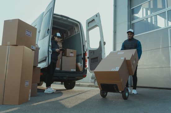 workers unloading packages